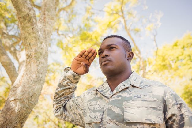 Picture of Black Veteran In Uniform Outdoors Saluting